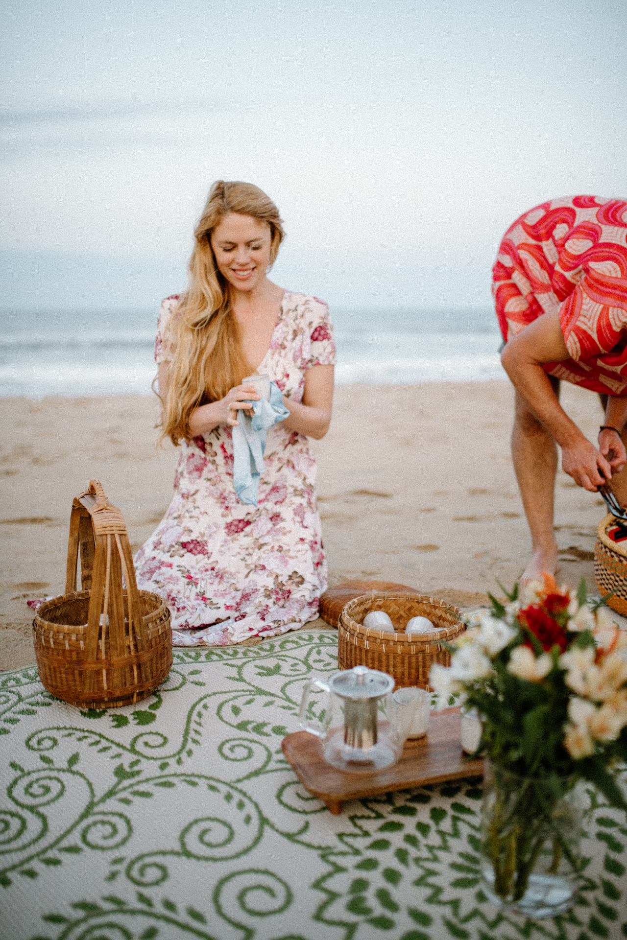 Tea ceremony on the beach at dusk